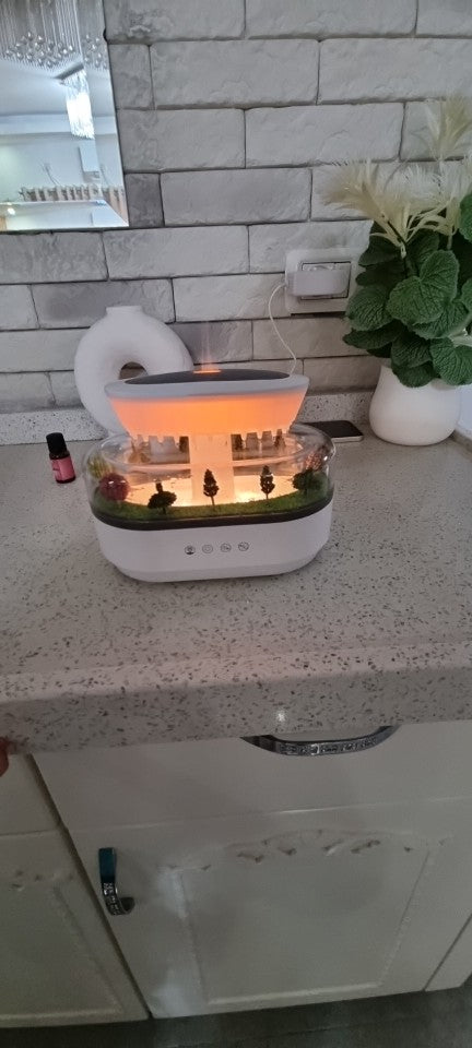 Misthaus on bathroom counter with plant